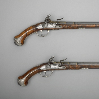 Flint-lock pistol with ramrod