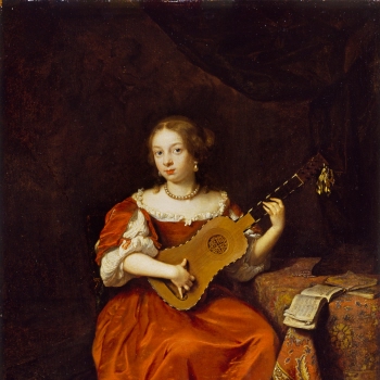 A Young Lady playing the Guitar