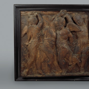 Relief of dancing putti
