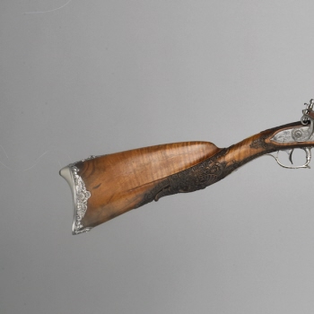 Flint-lock gun with ramrod