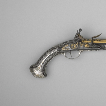 Flint-lock pistol with ramrod