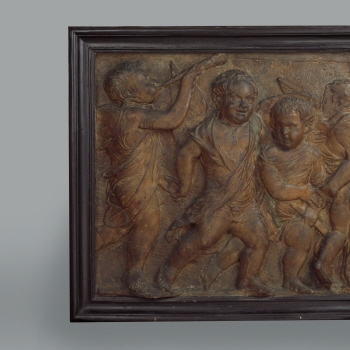 Relief of dancing putti