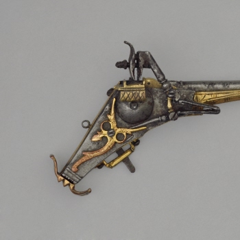 Miniature wheel-lock pistol