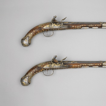 Flint-lock pistol with ramrod and tompion